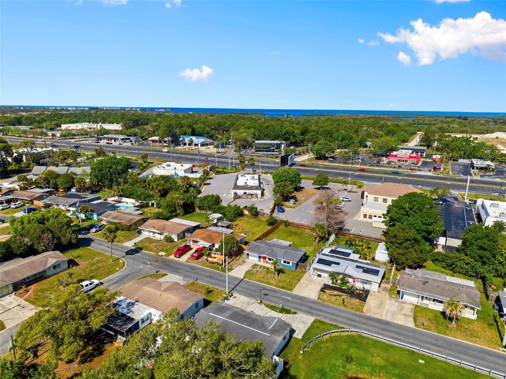 9033 Pegasus Avenue Port Richey, FL 34668 - Photo 56 of 56 an aerial view of residential houses with outdoor space