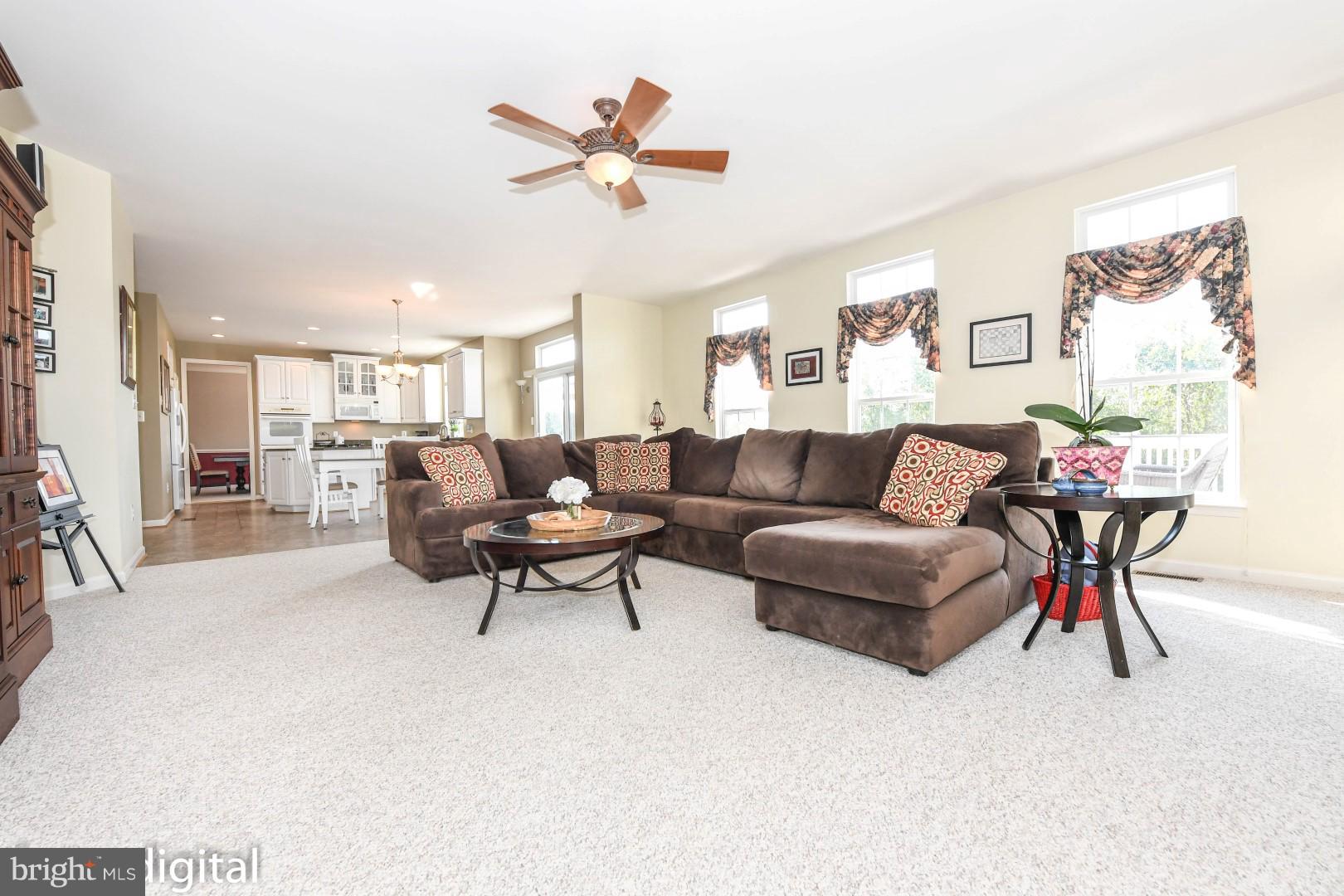 11026 Country Club Road New Market, MD 21774 - Photo 3 of 30 Great Room open to Kitchen w Stone Gas Fireplace