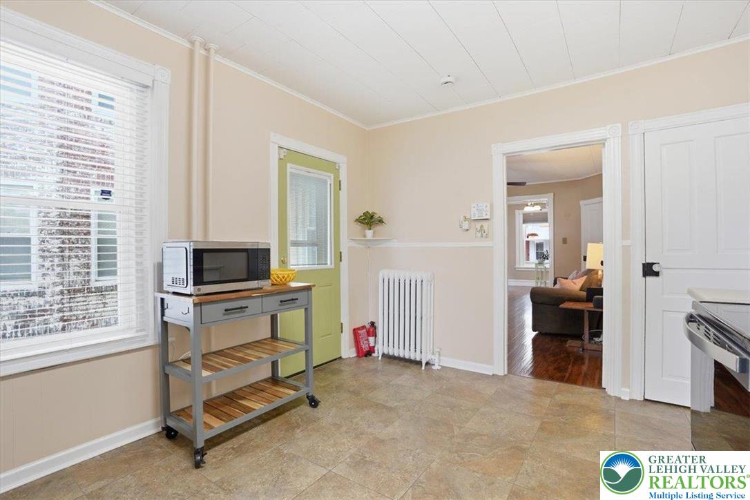 525 Ridge Street Emmaus, PA 18049 - Photo 25 of 68 This bright kitchen area features ample natural light and seamless flow into adjacent living spaces.