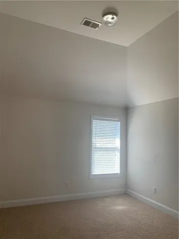 an empty room with closet