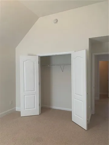 a bathroom with a bathtub and a toilet