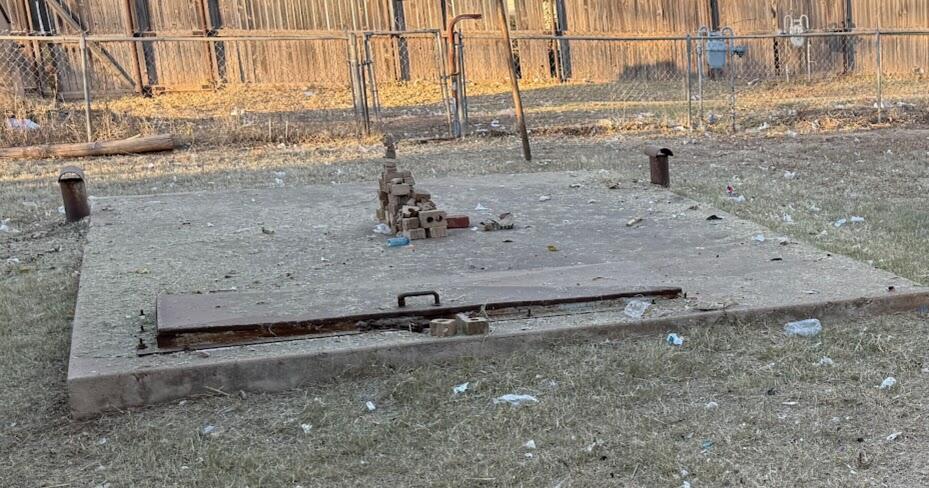 2014 West 20th Plainview, TX 79072 - Photo 6 of 7 a view of a dry yard with wooden fence
