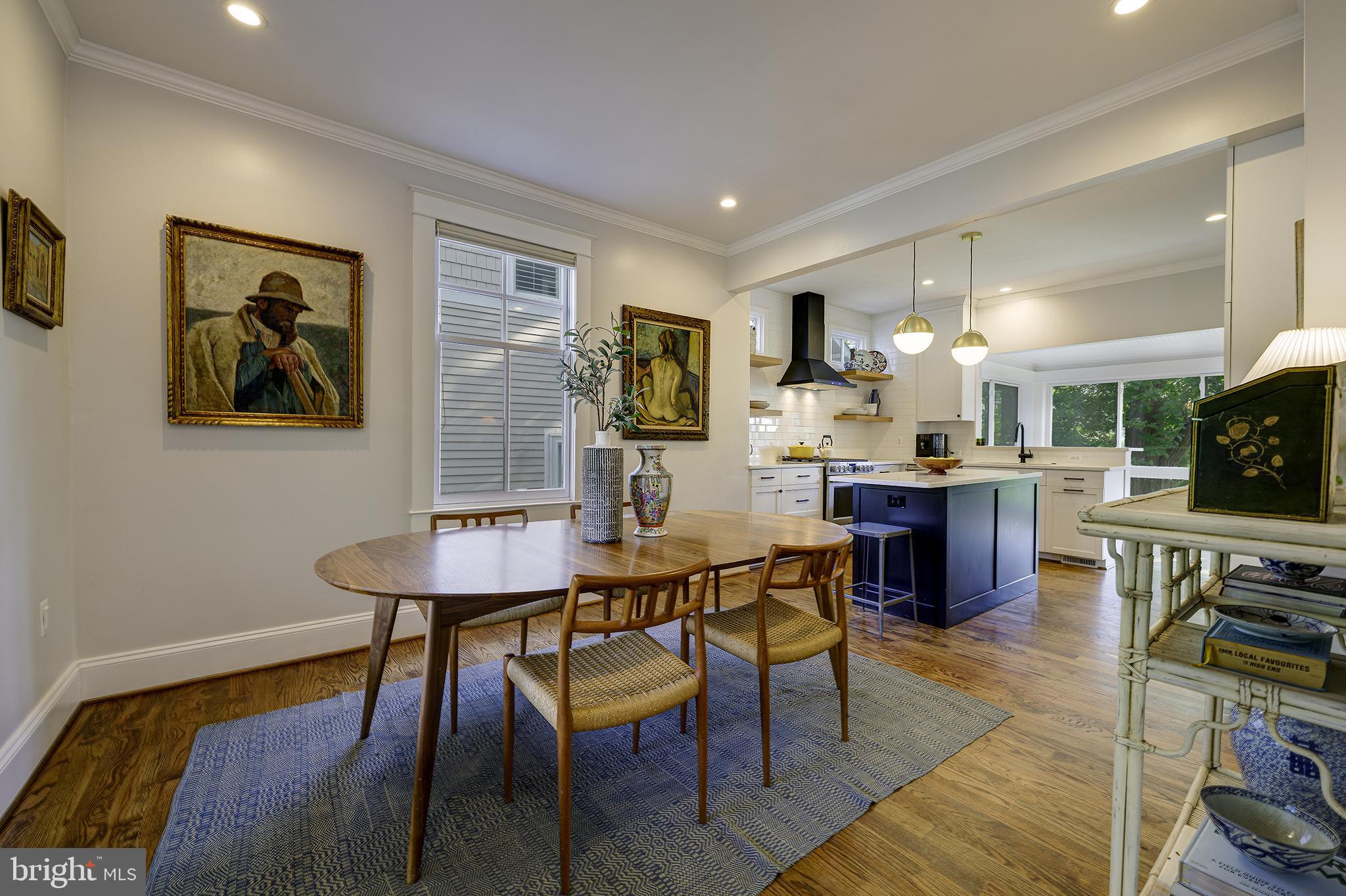 5710 Broad Branch Road Northwest Washington, DC 20015 - Photo 4 of 25 a view of a dining room with furniture and wooden floor