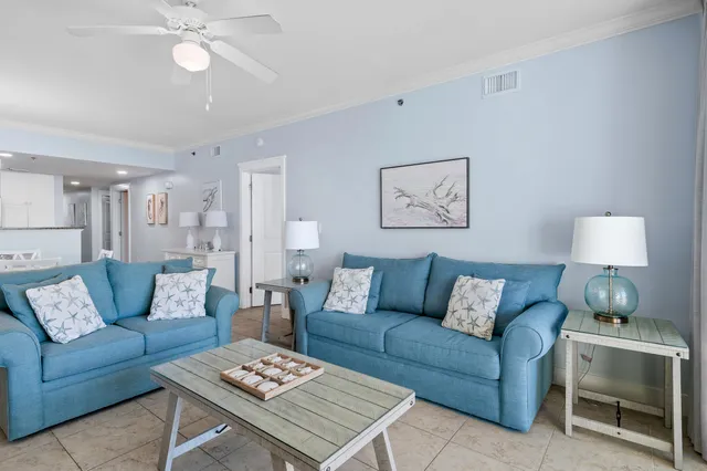 a kitchen with stainless steel appliances granite countertop a refrigerator a stove and a sink