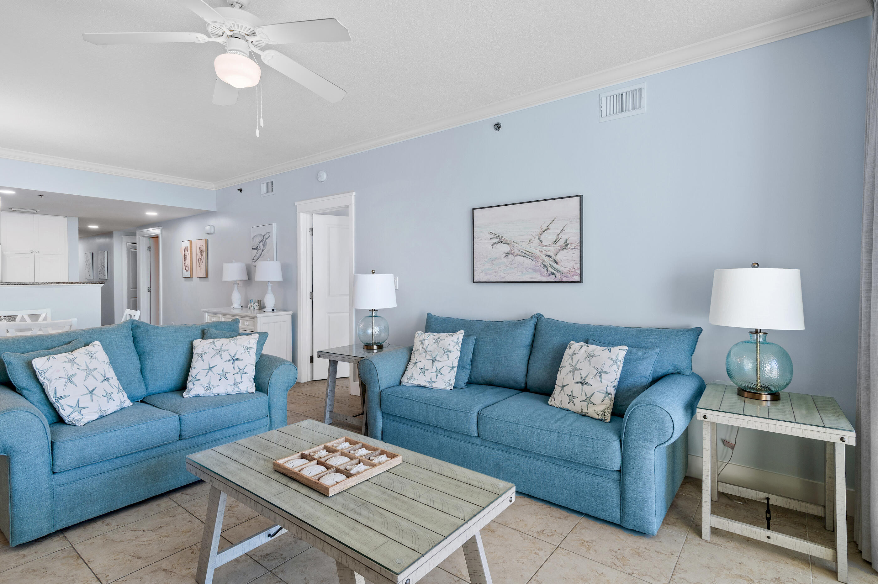 1110 Santa Rosa Boulevard, Unit C500 Fort Walton Beach, FL 32548 - Photo 11 of 59 a living room with furniture a rug and a lamp