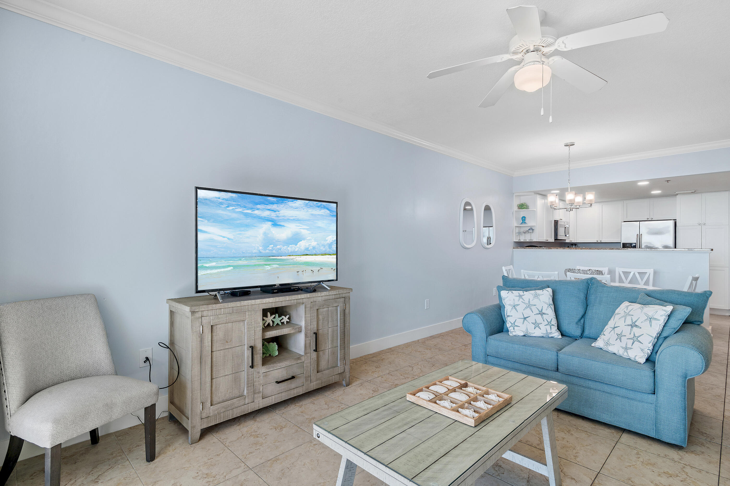 1110 Santa Rosa Boulevard, Unit C500 Fort Walton Beach, FL 32548 - Photo 12 of 59 a living room with furniture and a flat screen tv