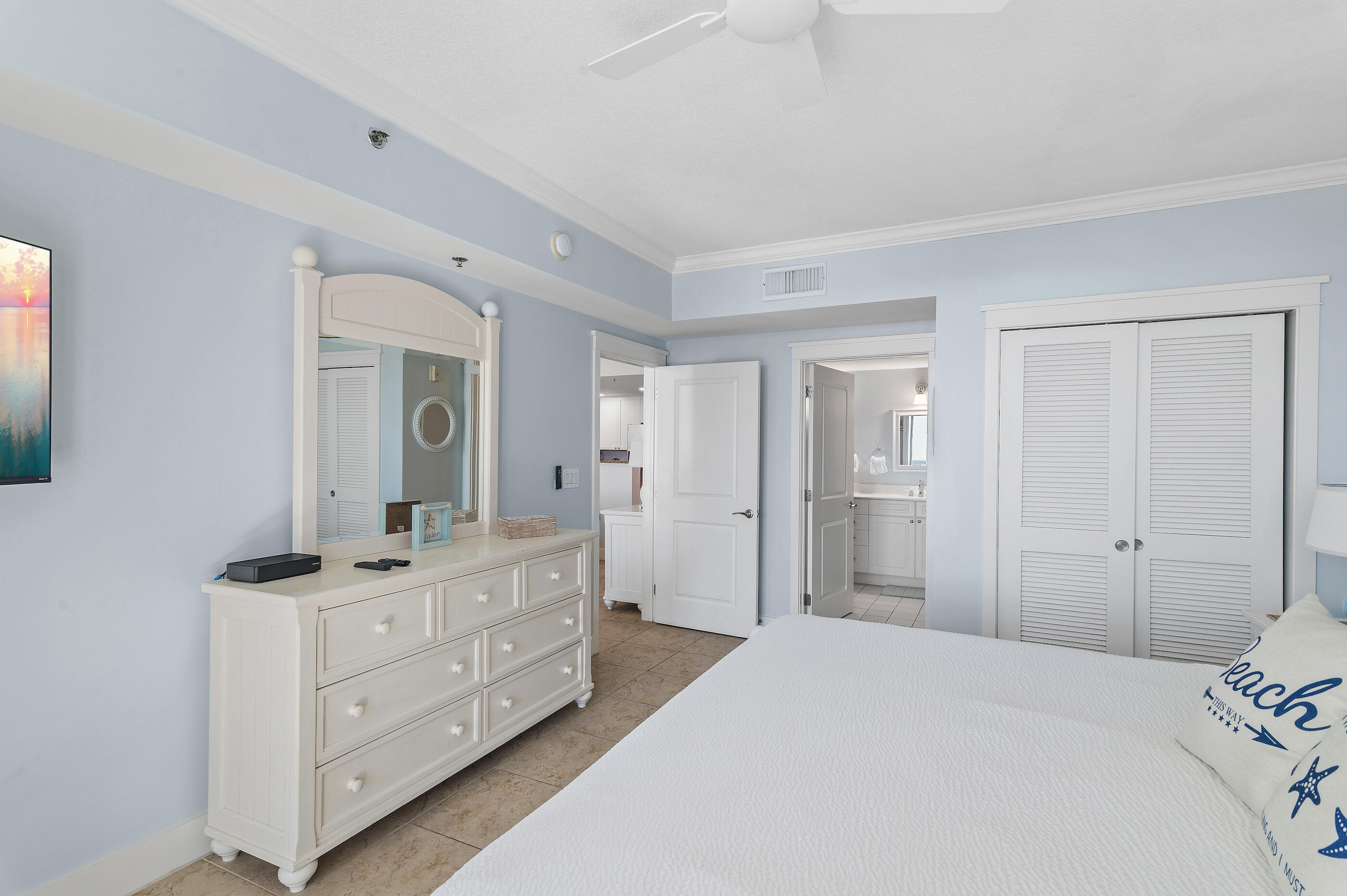 1110 Santa Rosa Boulevard, Unit C500 Fort Walton Beach, FL 32548 - Photo 21 of 59 a bedroom with a bed and a dresser