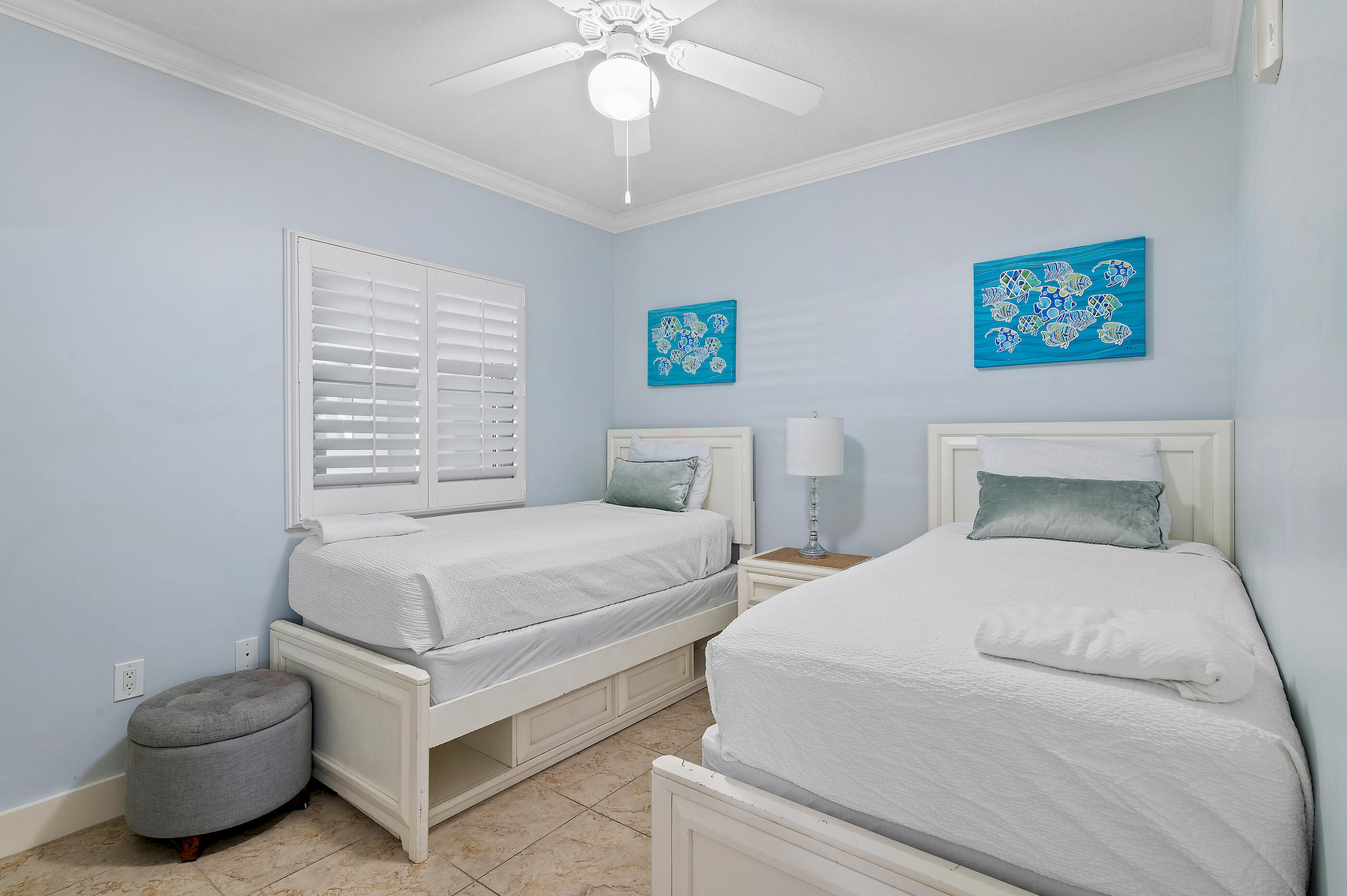 1110 Santa Rosa Boulevard, Unit C500 Fort Walton Beach, FL 32548 - Photo 27 of 59 a bedroom with a bed and a chandelier