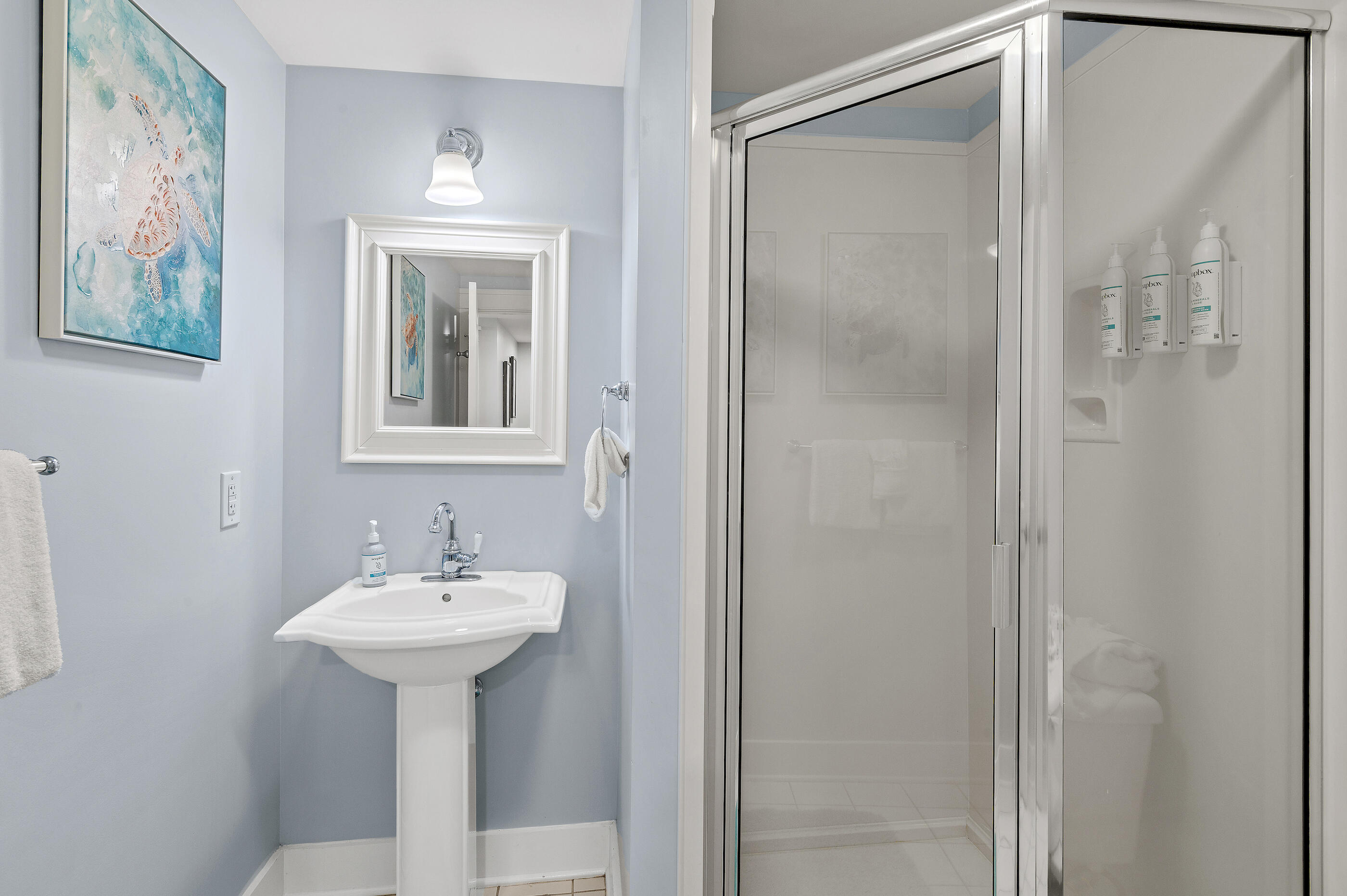 1110 Santa Rosa Boulevard, Unit C500 Fort Walton Beach, FL 32548 - Photo 29 of 59 a bathroom with a sink and mirror