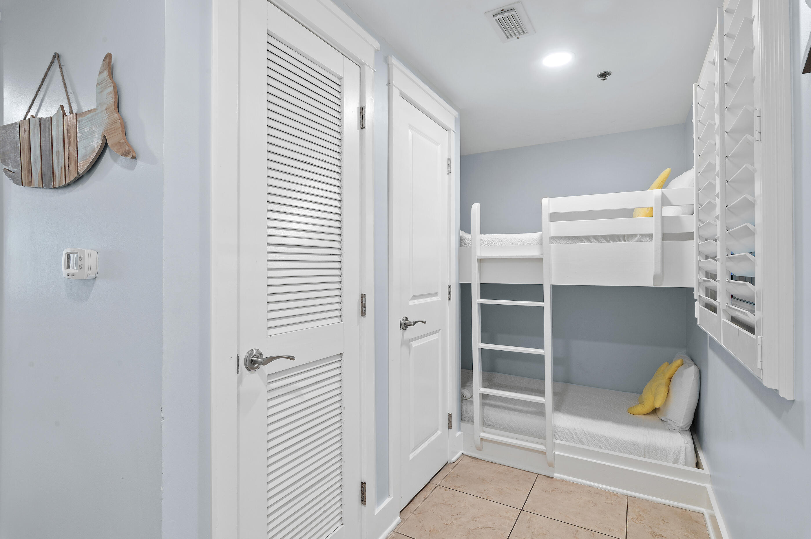 1110 Santa Rosa Boulevard, Unit C500 Fort Walton Beach, FL 32548 - Photo 30 of 59 a view of a hallway to rooms and stairs