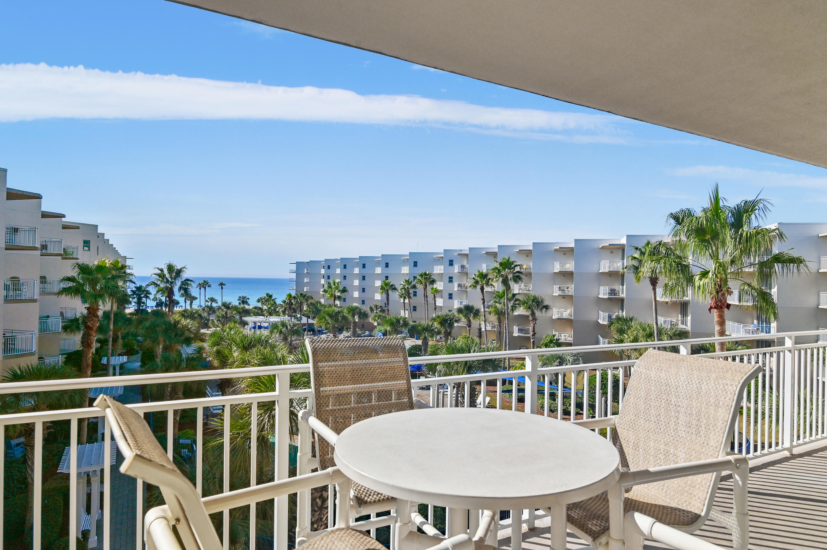 1110 Santa Rosa Boulevard, Unit C500 Fort Walton Beach, FL 32548 - Photo 3 of 59 a view of a balcony with table and chairs