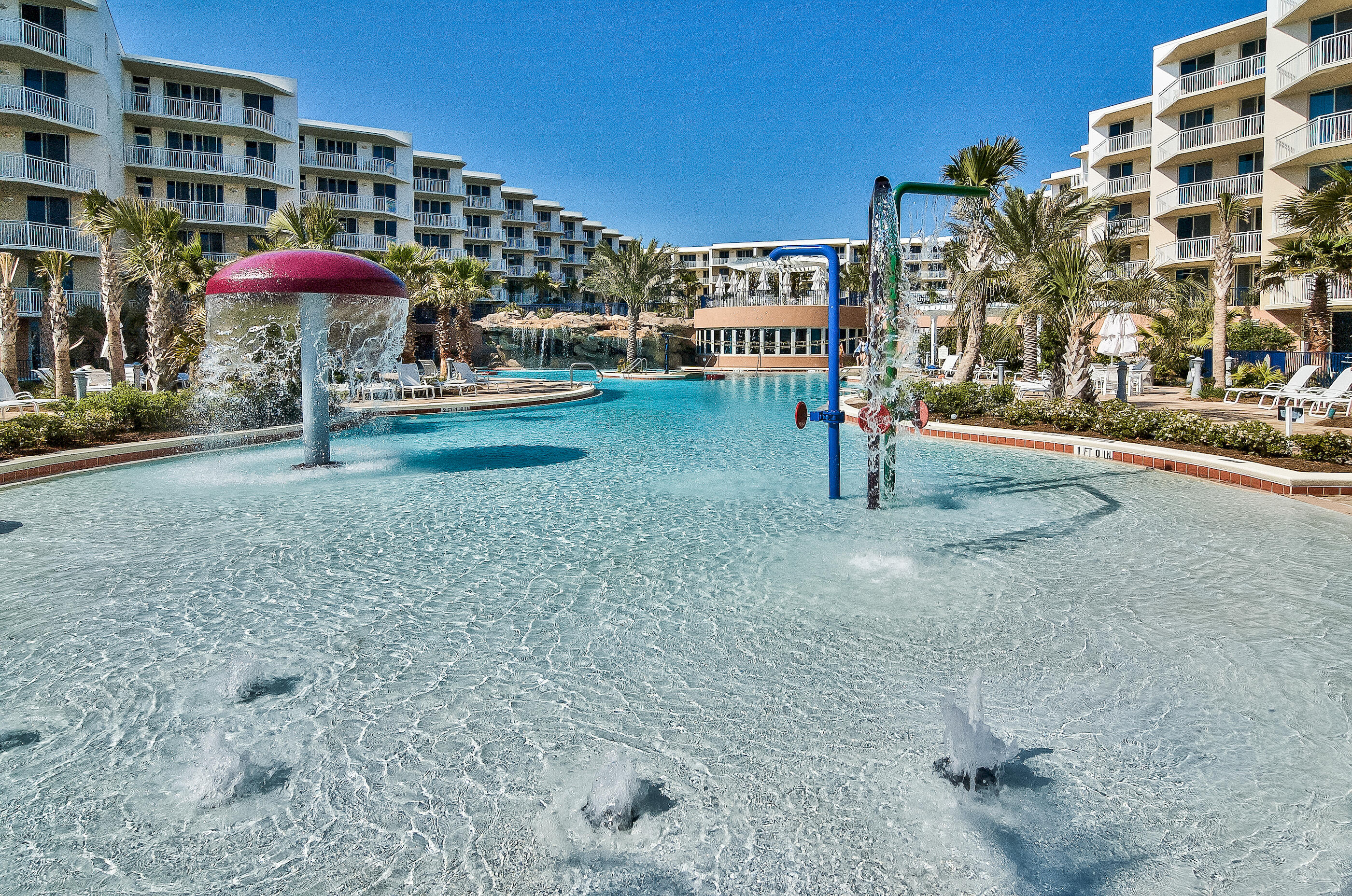 1110 Santa Rosa Boulevard, Unit C500 Fort Walton Beach, FL 32548 - Photo 50 of 59 a view of a patio with a table and chairs