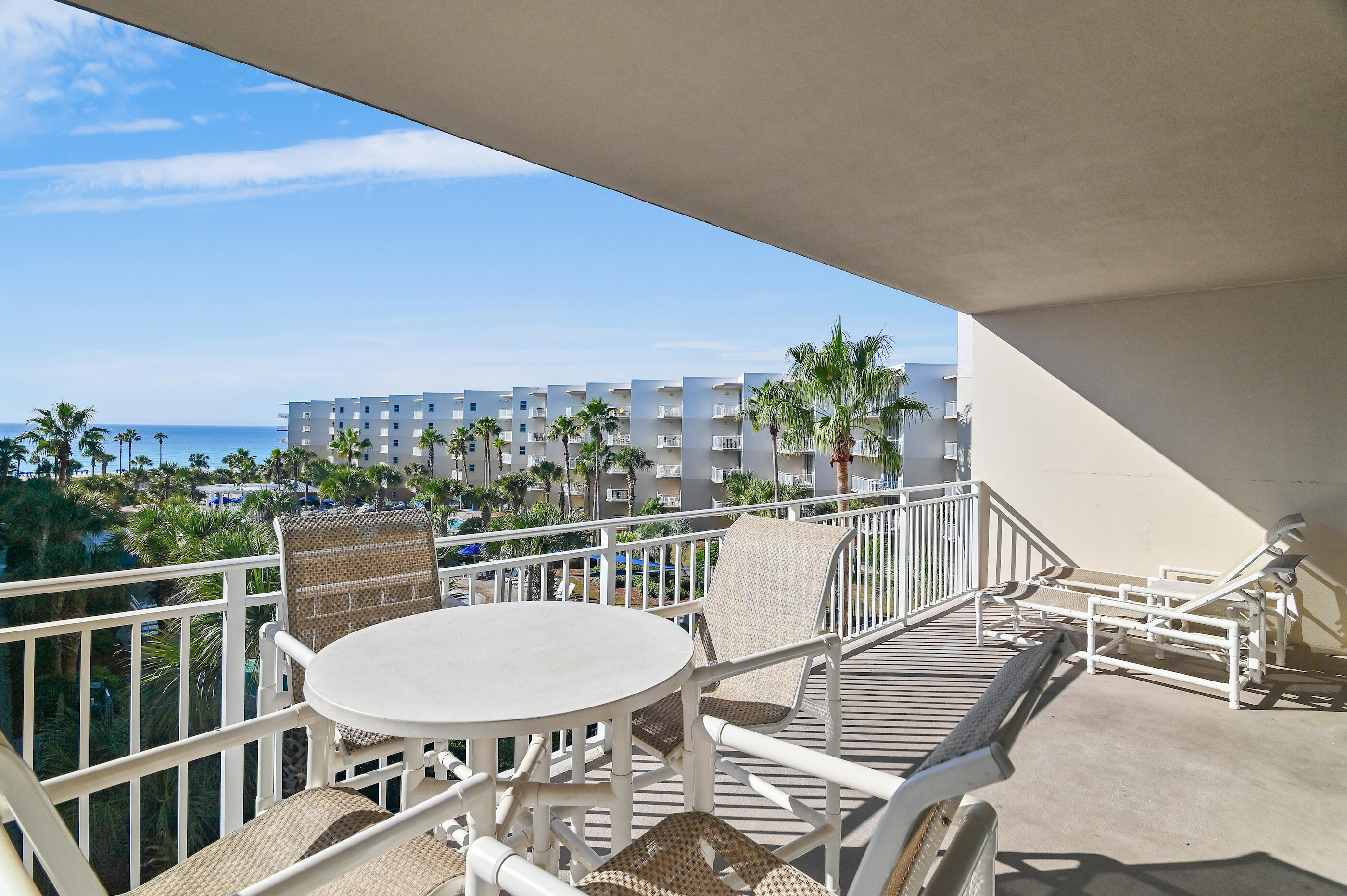 1110 Santa Rosa Boulevard, Unit C500 Fort Walton Beach, FL 32548 - Photo 8 of 59 a balcony with table and chairs