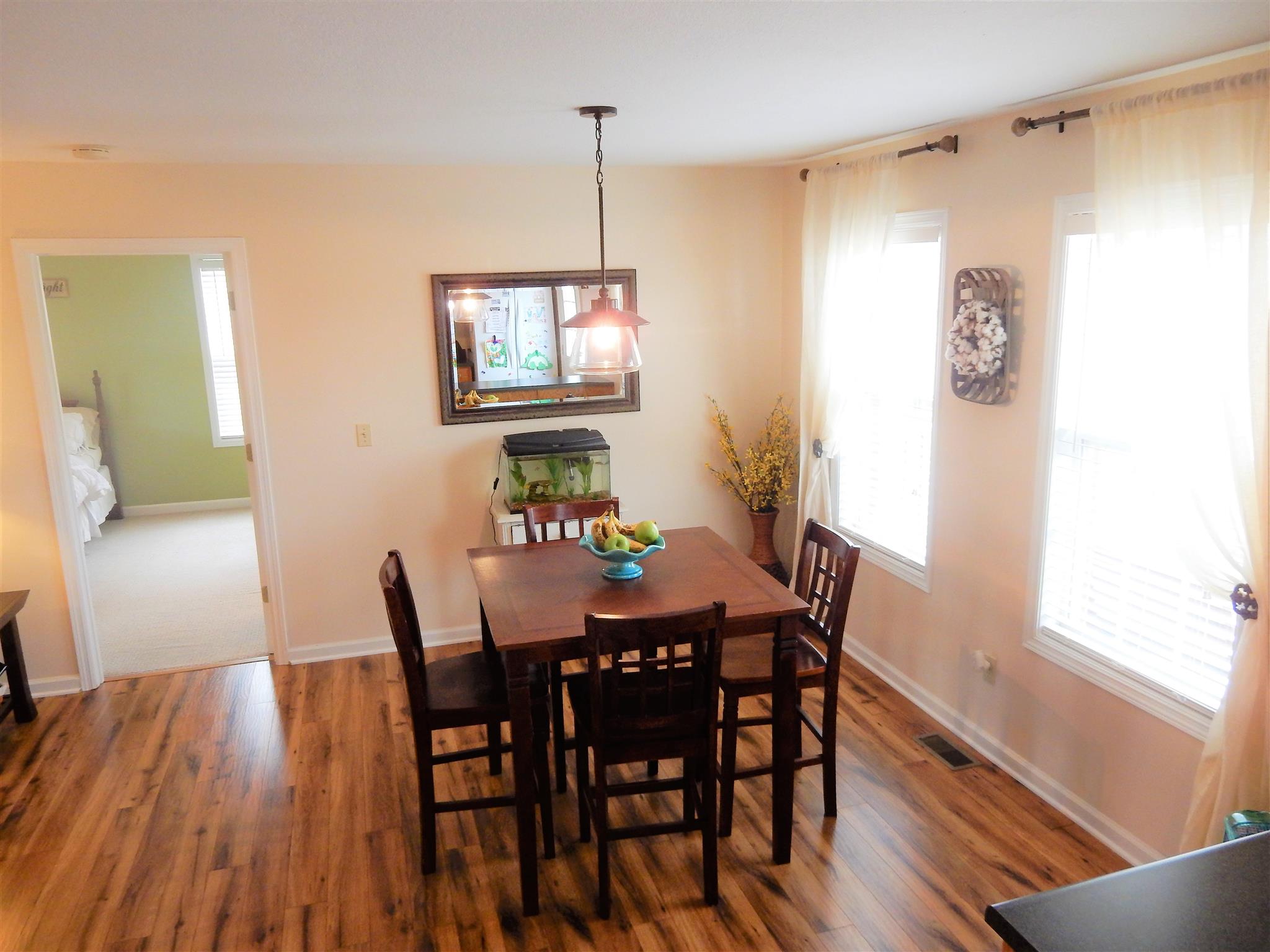 11 Heather Road Fayetteville, TN 37334 - Photo 8 of 20 a view of a dining room with furniture window and wooden floor