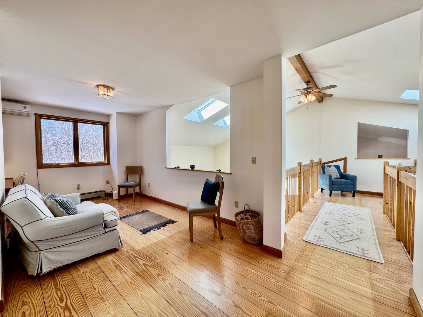 103 Meadow View Road Oak Bluffs, MA 02557 - Photo 14 of 26 a living room with furniture and a wooden floor