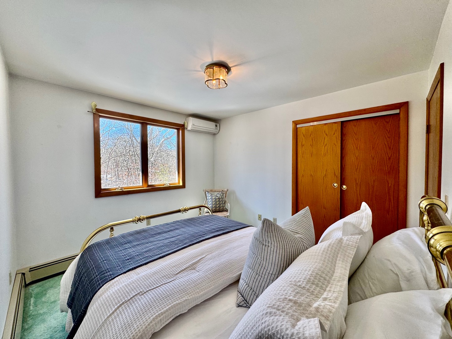 103 Meadow View Road Oak Bluffs, MA 02557 - Photo 20 of 26 a bedroom with a bed and a window