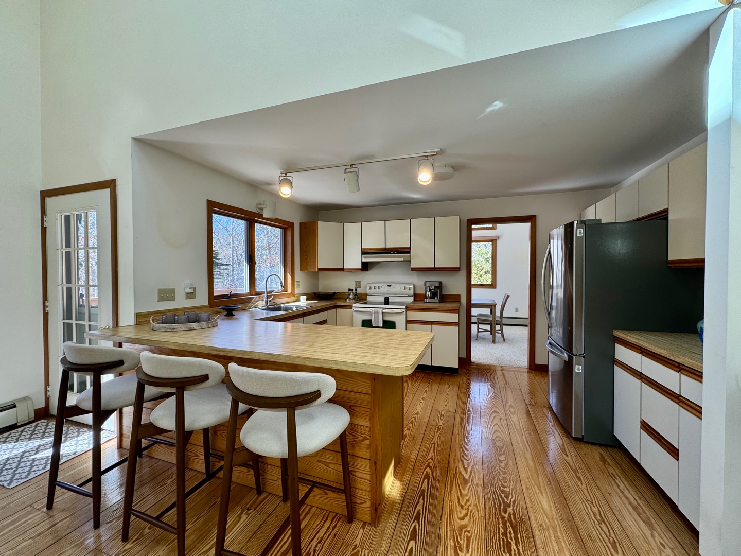 103 Meadow View Road Oak Bluffs, MA 02557 - Photo 4 of 26 a room with dining table and chairs
