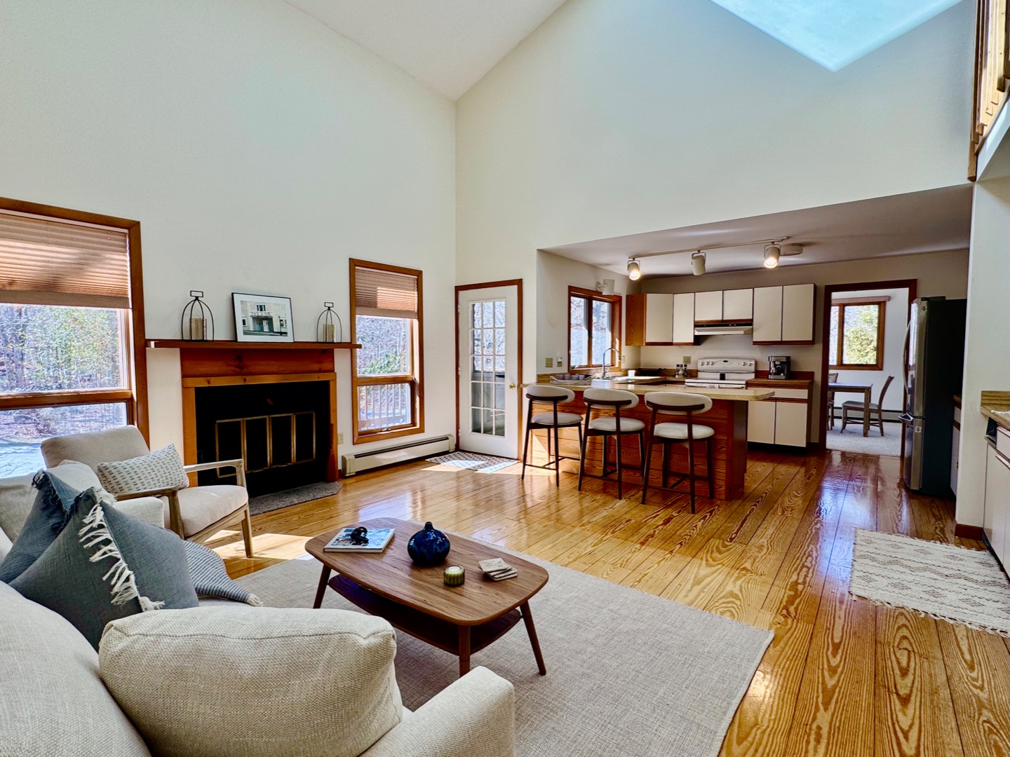 103 Meadow View Road Oak Bluffs, MA 02557 - Photo 6 of 26 a living room with furniture and a fireplace