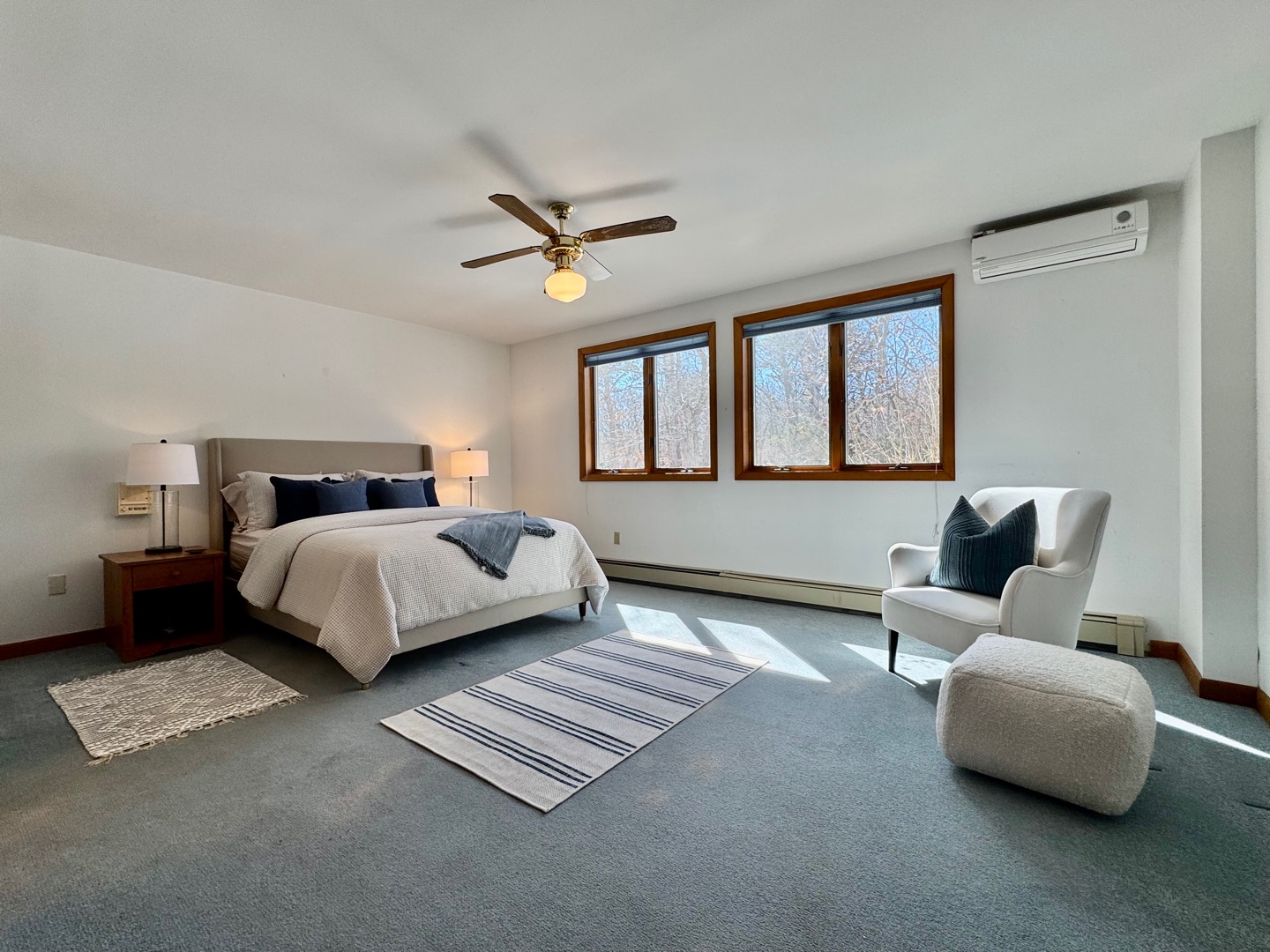 103 Meadow View Road Oak Bluffs, MA 02557 - Photo 9 of 26 a bedroom with a bed couch and window