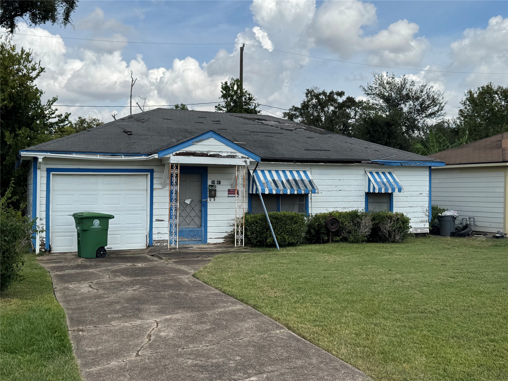 3441 Good Hope Street Houston, TX 77021 - Photo 4 of 7 a front view of a house with a garden and plants