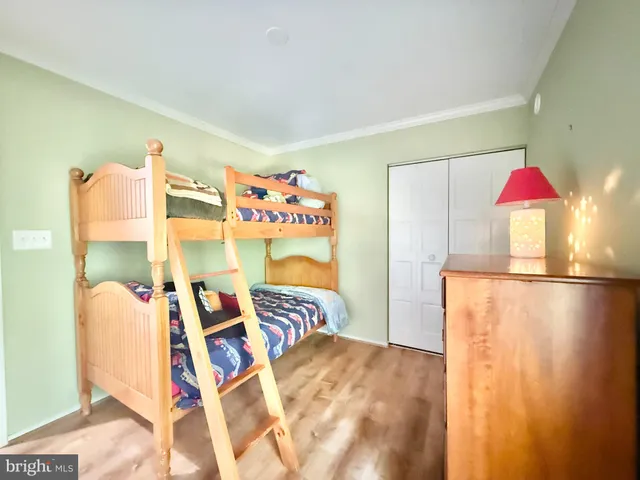 a bed room with a bed and a table