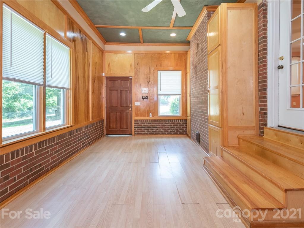 1901 Bertha Knight Road Lancaster, SC 29720 - Photo 14 of 43 a view of empty room with wooden floor and fan