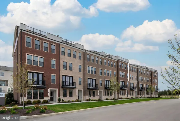 a view of a building with a street