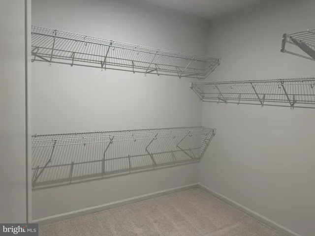 a view of a room with racks on the wall
