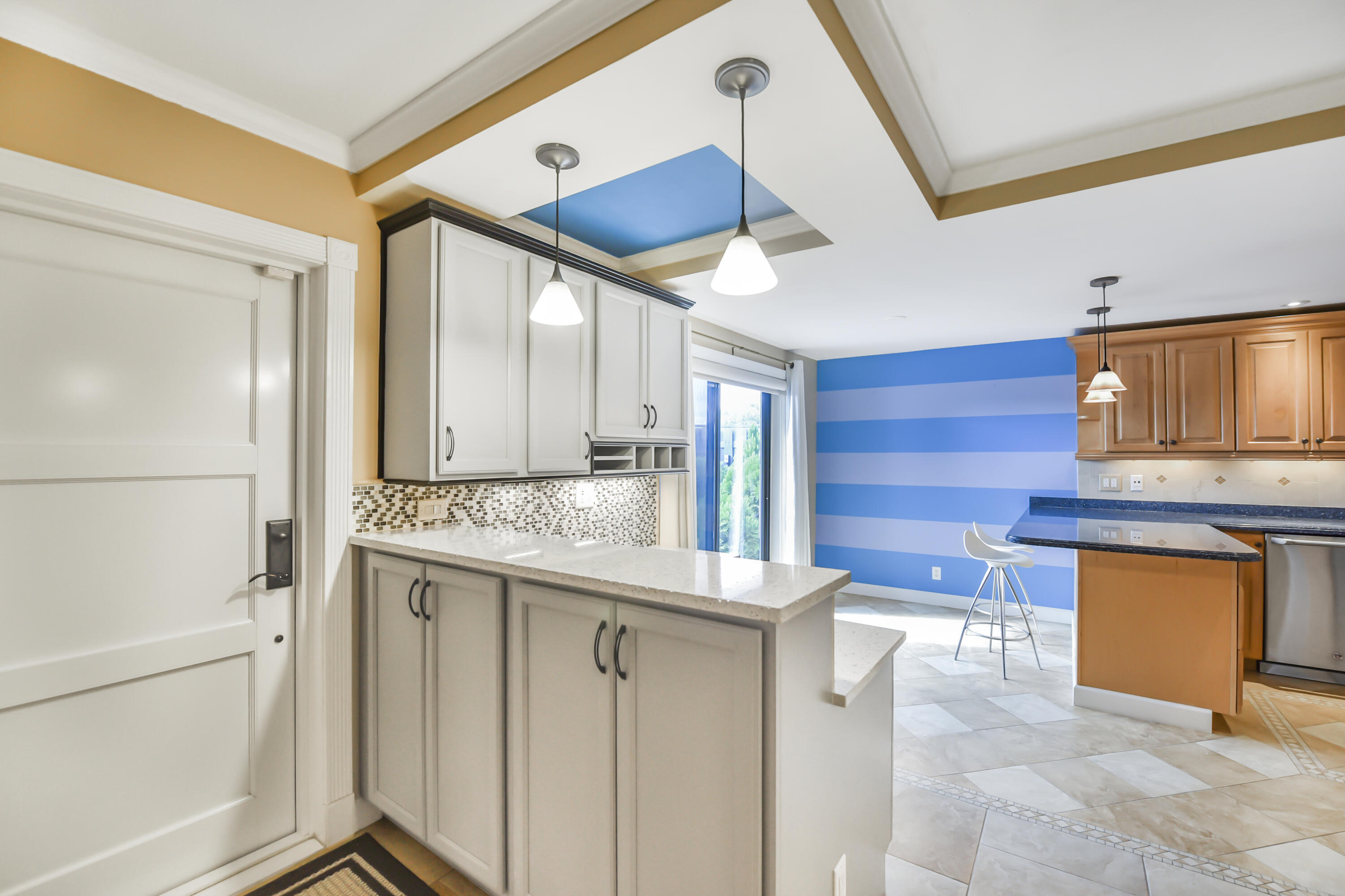 102 Woodland Road Palm Springs, FL 33461 - Photo 15 of 41 a bathroom with a sink a mirror and a shower