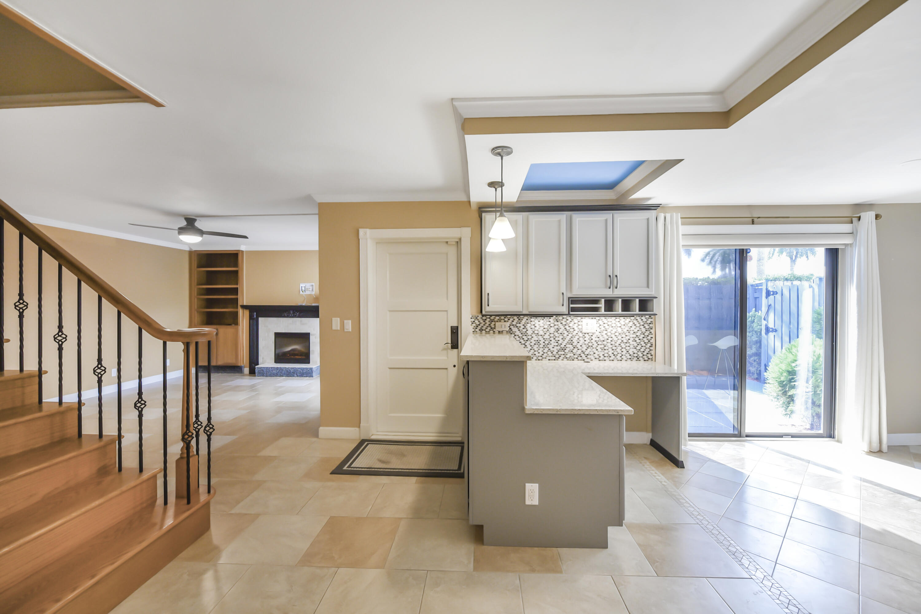 102 Woodland Road Palm Springs, FL 33461 - Photo 25 of 41 a view of kitchen with furniture and large window