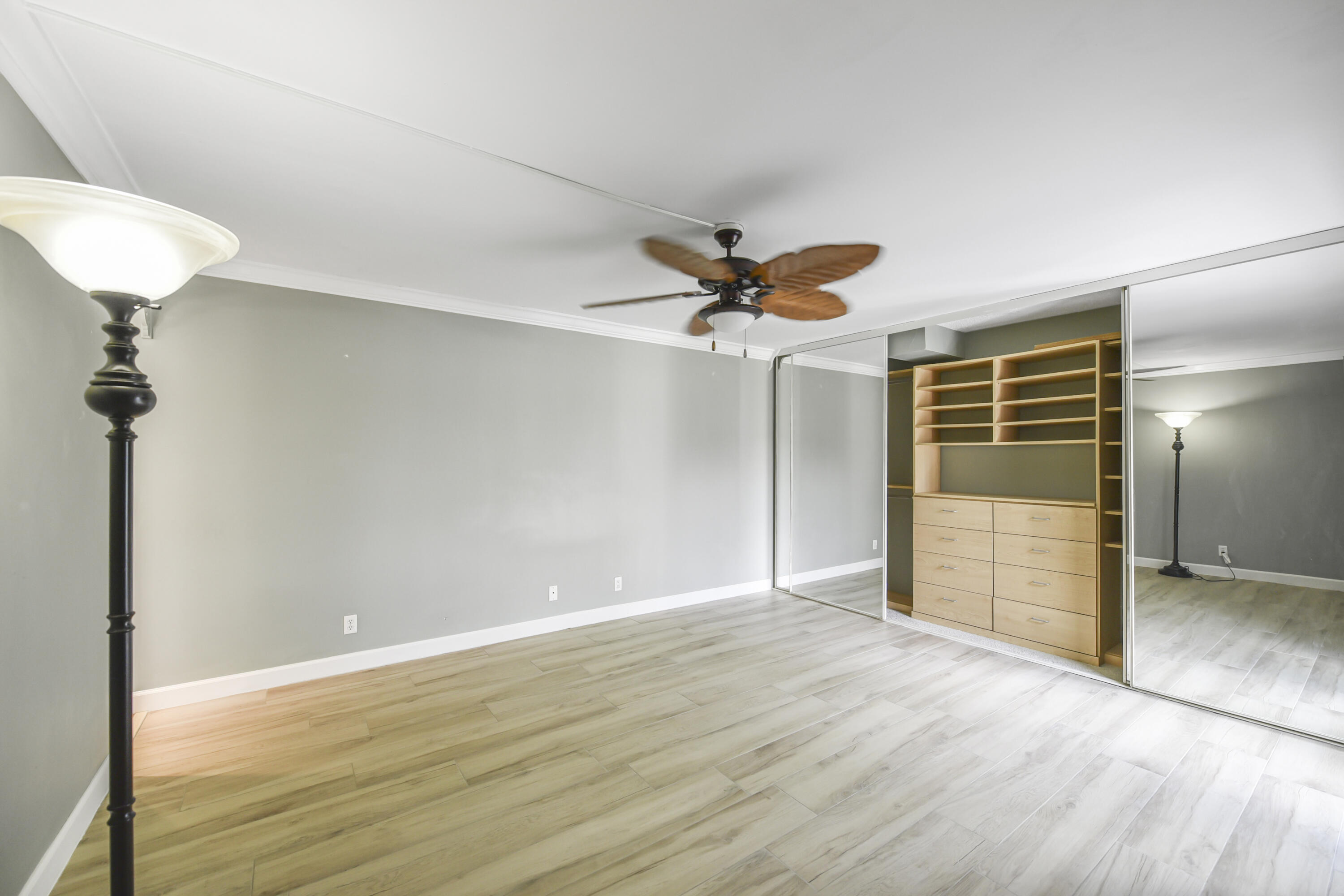 102 Woodland Road Palm Springs, FL 33461 - Photo 29 of 41 a view of an empty room with a window