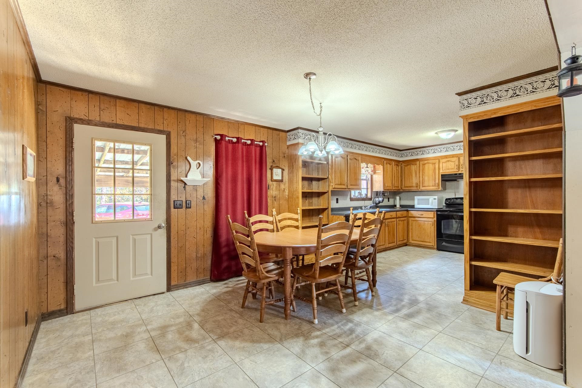 4485 Holland Creek Road Savannah, TN 38372 - Photo 16 of 39 a view of a kitchen and dining room