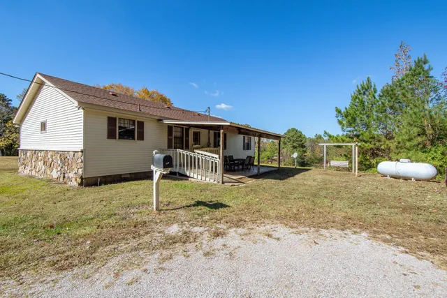 a view of outdoor space and a yard