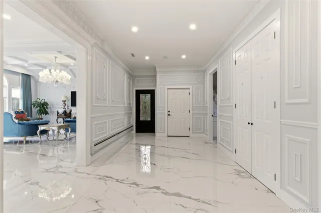 a bathroom with a toilet a sink and a mirror