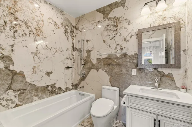 a view of a bathroom with a glass door