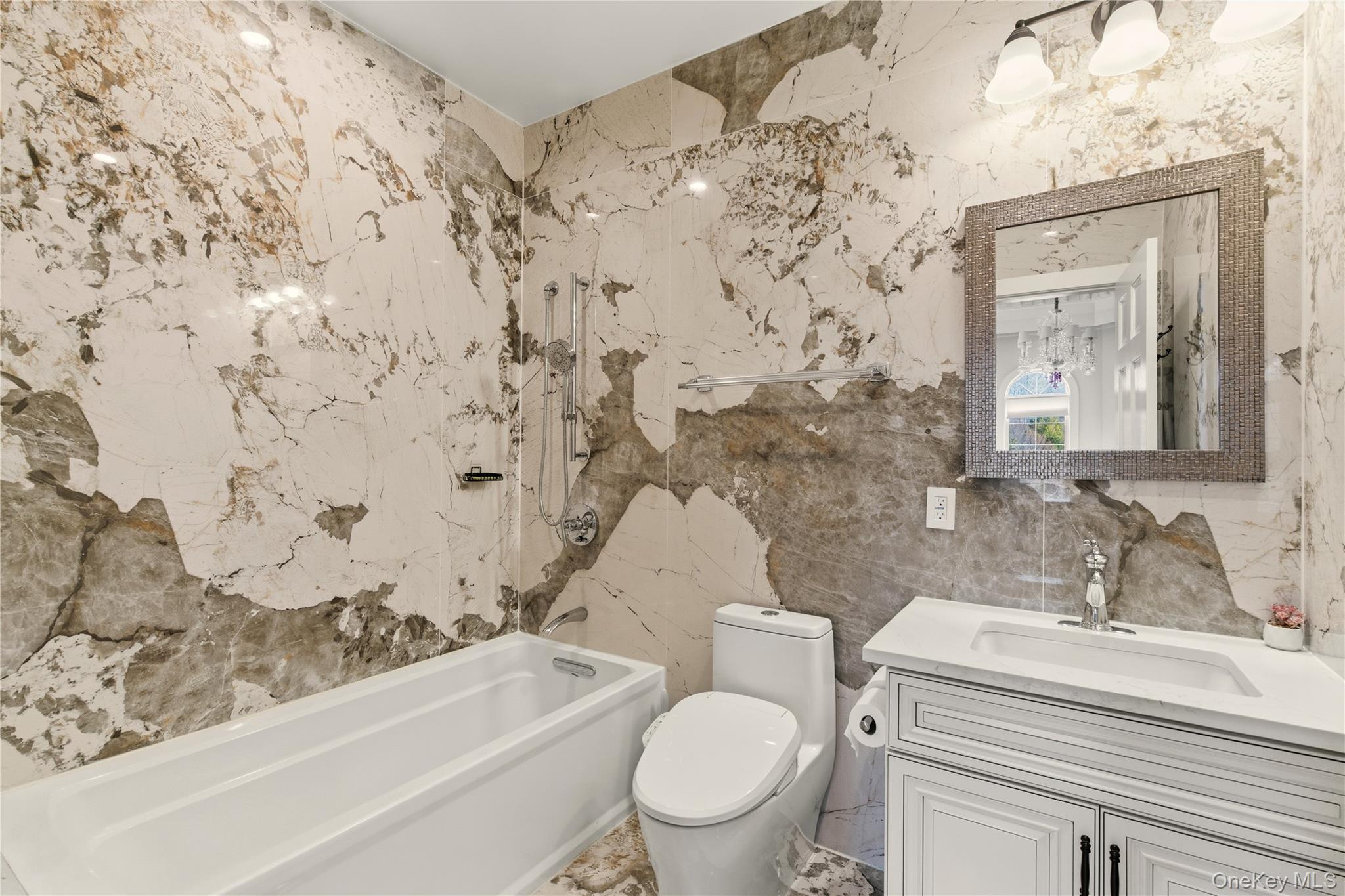 265 Laurel Lane Syosset, NY 11791 - Photo 31 of 48 a bathroom with a sink toilet and shower