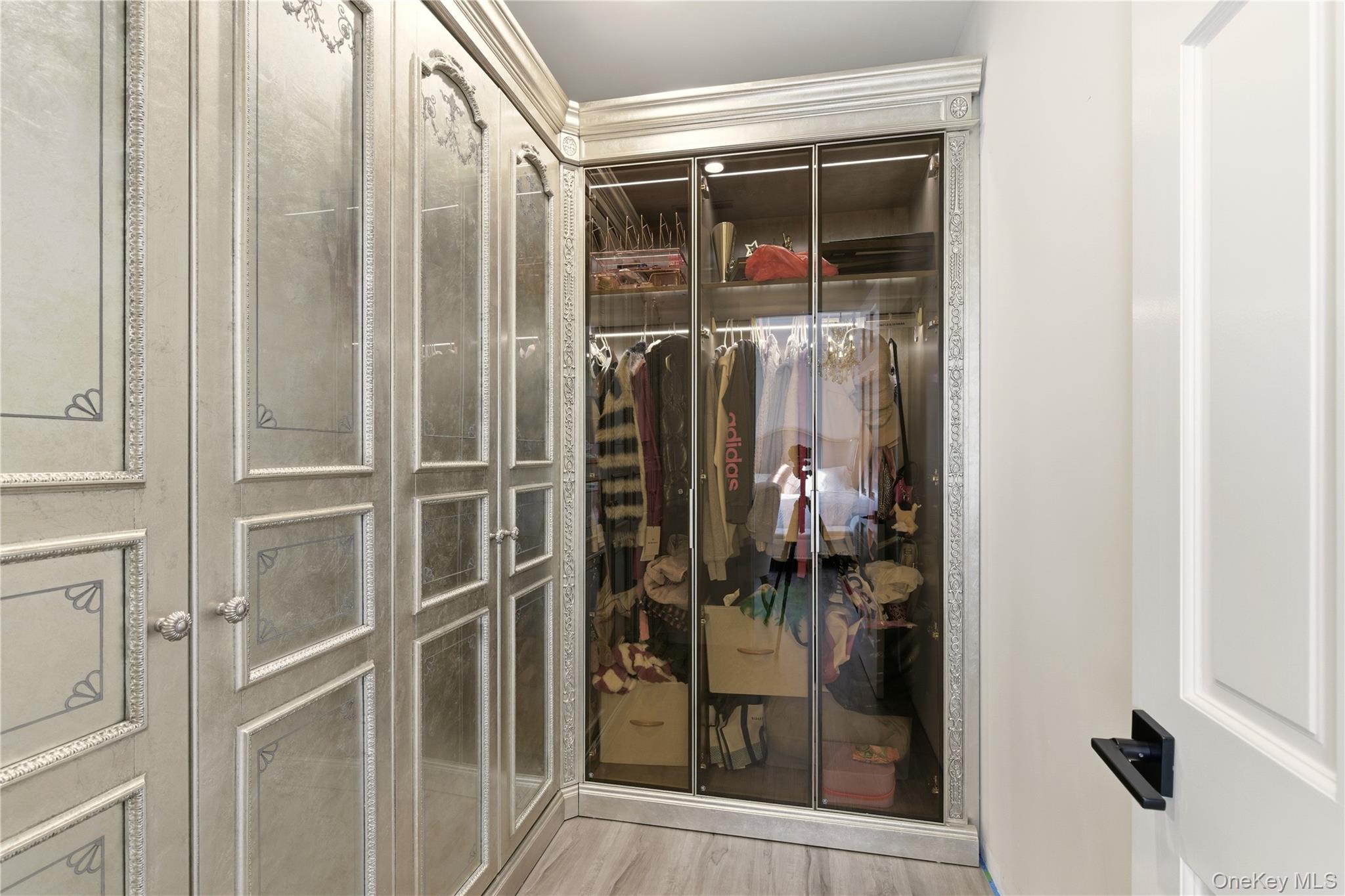 265 Laurel Lane Syosset, NY 11791 - Photo 32 of 48 a view of a bathroom with a glass door