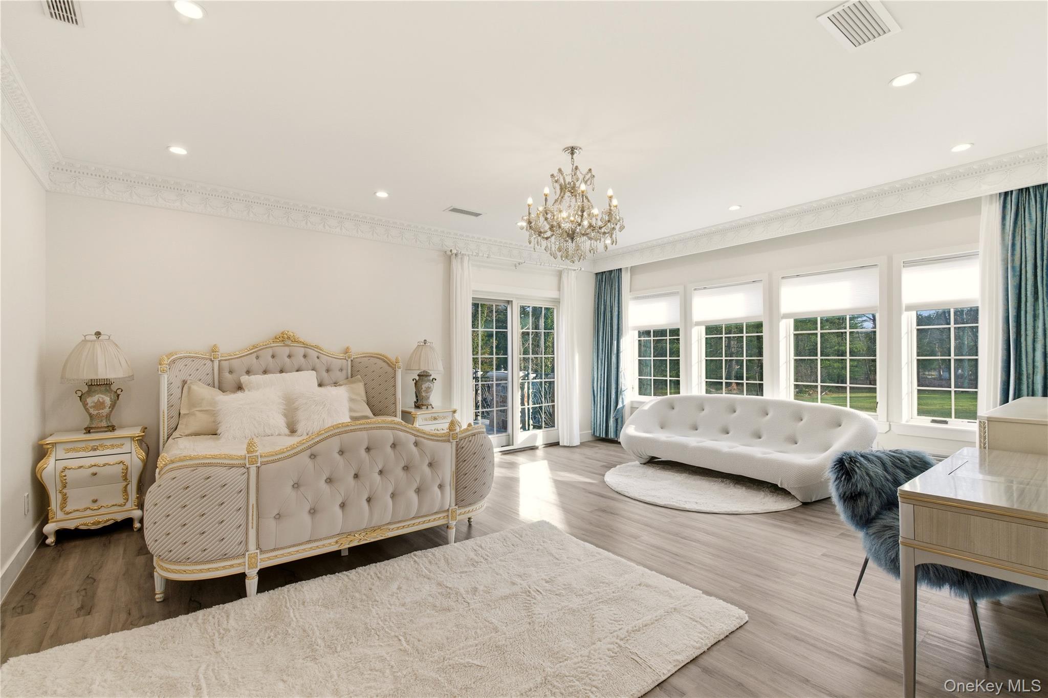 265 Laurel Lane Syosset, NY 11791 - Photo 33 of 48 a living room with furniture and a large window