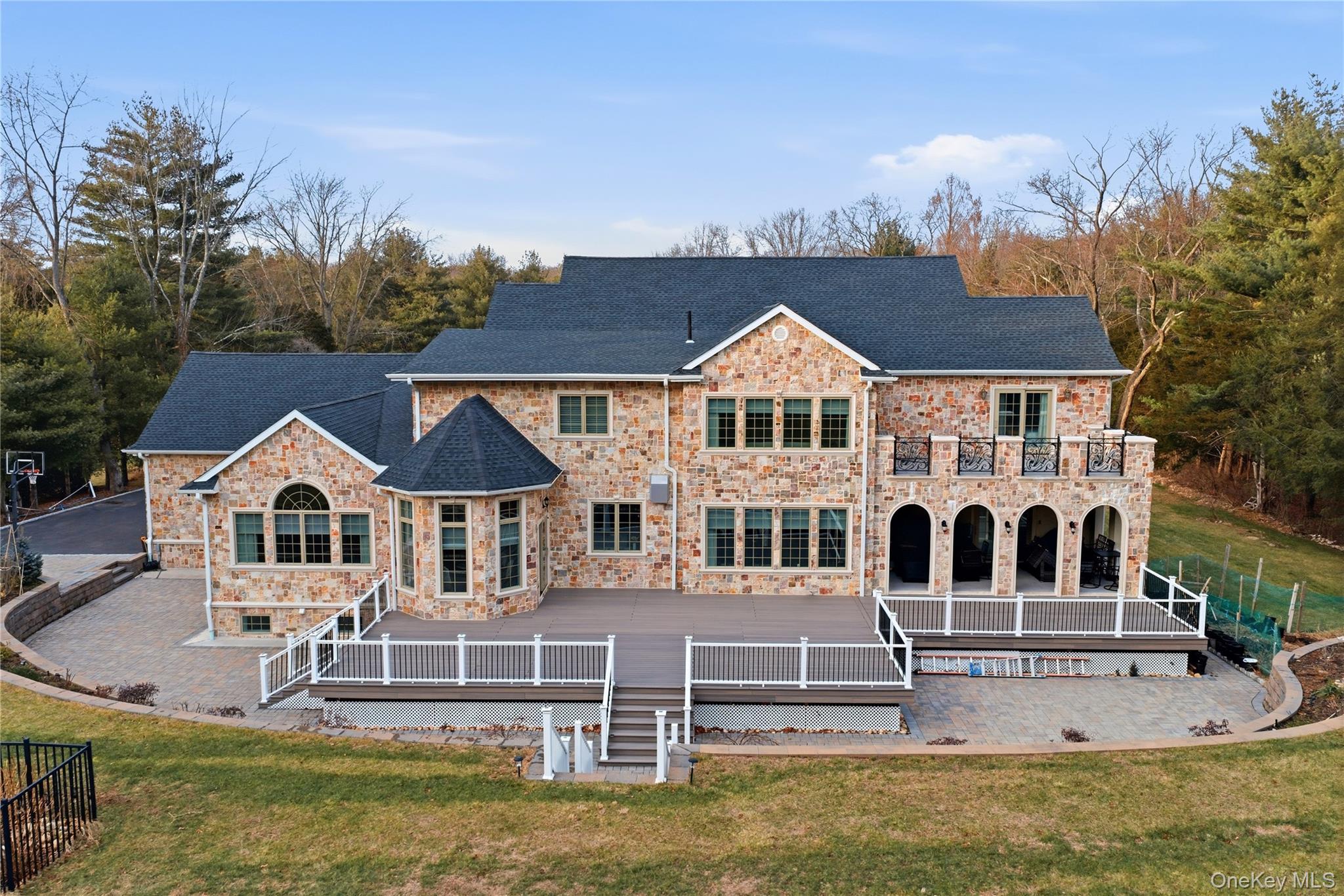 265 Laurel Lane Syosset, NY 11791 - Photo 43 of 48 a front view of a house with a garden