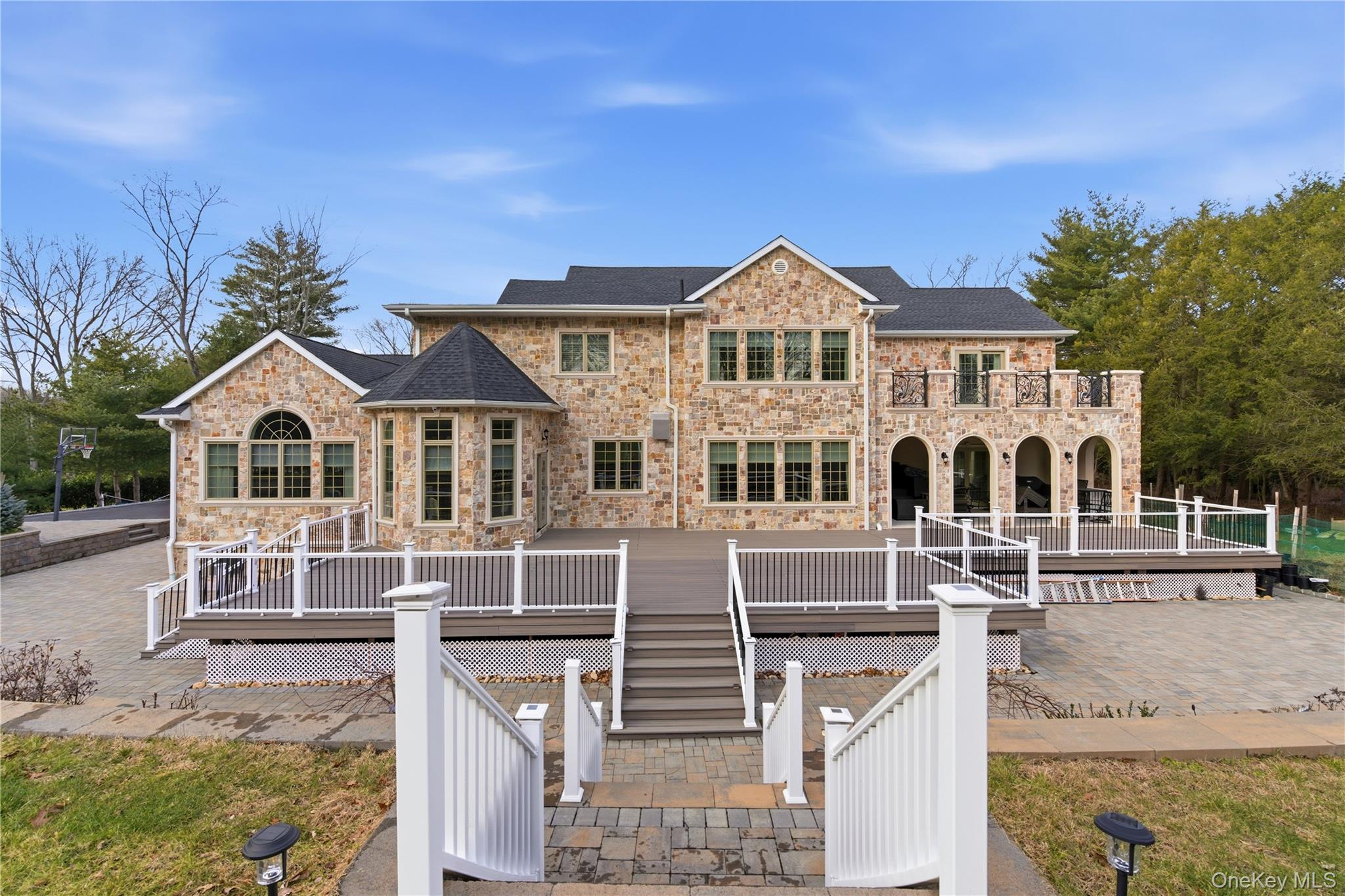 265 Laurel Lane Syosset, NY 11791 - Photo 44 of 48 a front view of a house with a yard