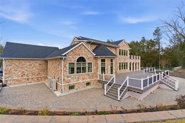 a view of a table chairs and a fire pit