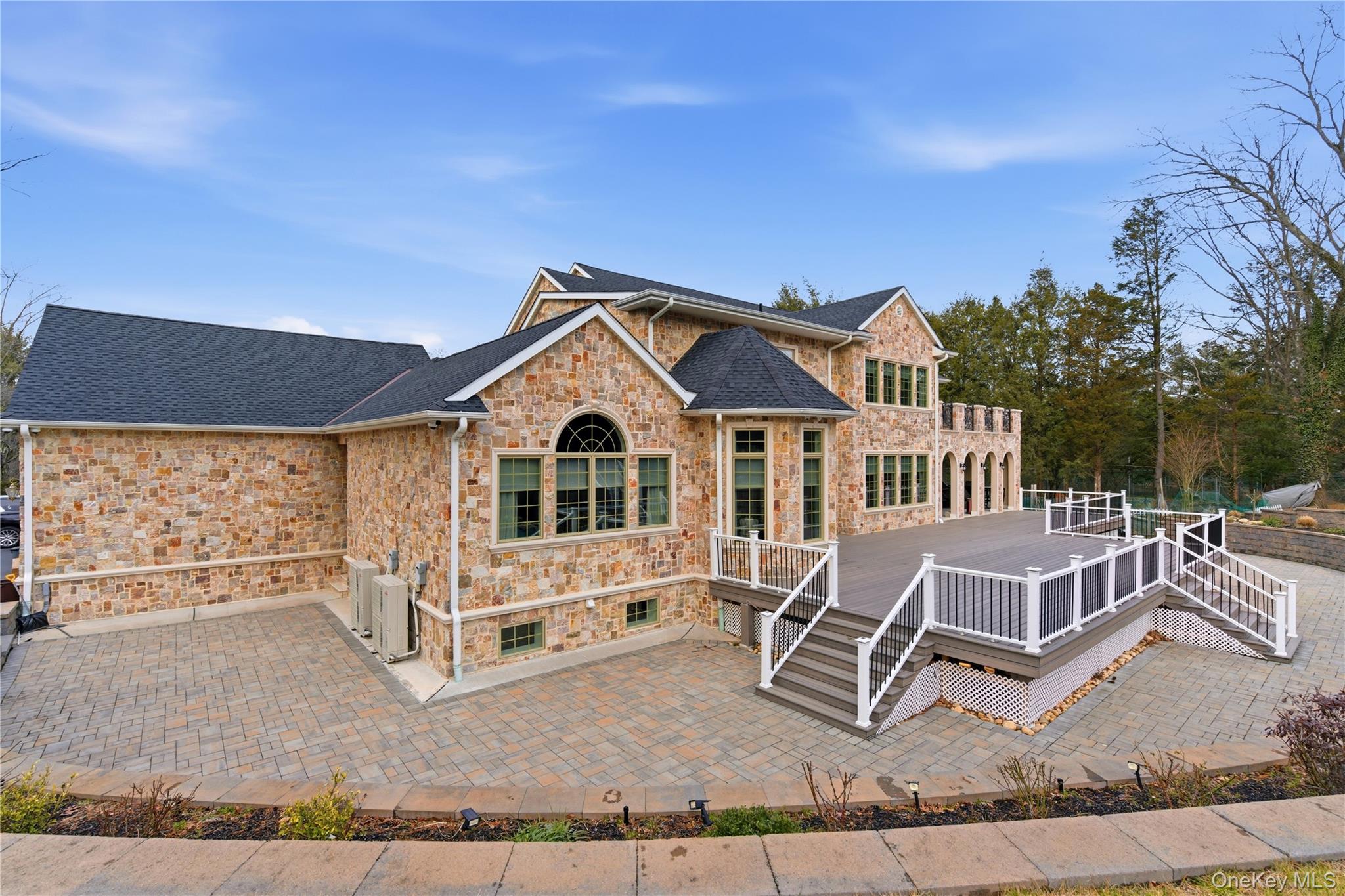 265 Laurel Lane Syosset, NY 11791 - Photo 45 of 48 a front view of a house with garden