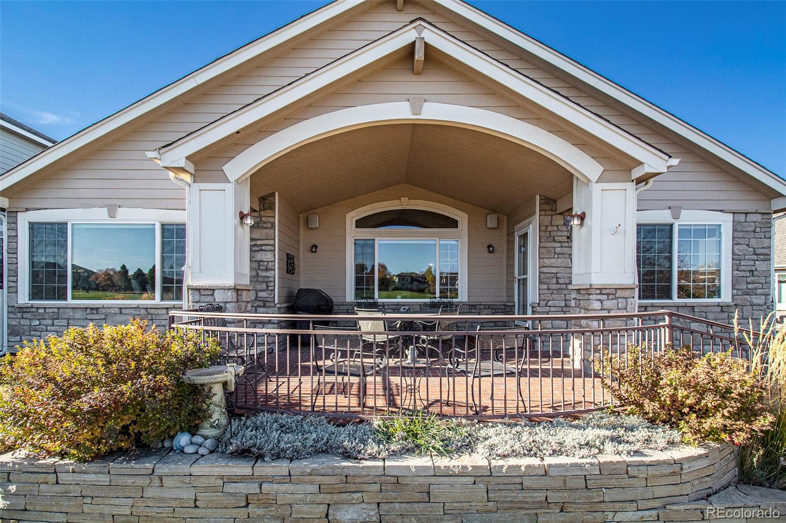 10604 Osceola Loop Westminster, CO 80031 - Photo 31 of 32 a front view of a house with swimming pool