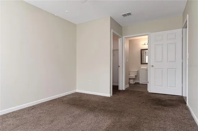 a view of a room with a bathroom