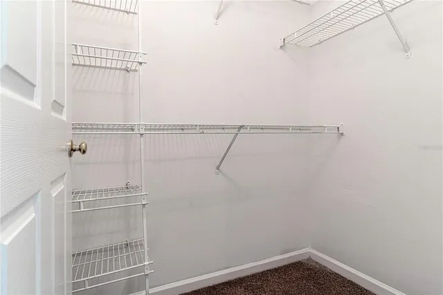 a view of a room with racks on the wall