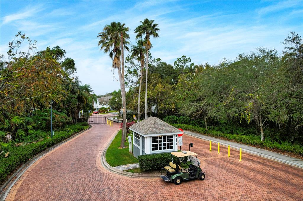 4324 South Kirkman Road, Unit 1103 Orlando, FL 32811 - Photo 17 of 20 a front view of a house with garden