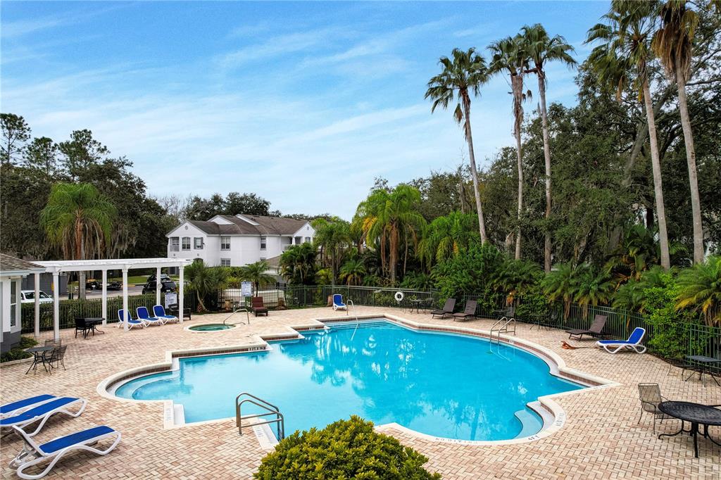4324 South Kirkman Road, Unit 1103 Orlando, FL 32811 - Photo 19 of 20 swimming pool with outdoor seating