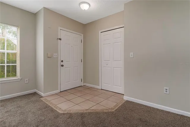 an empty room with windows