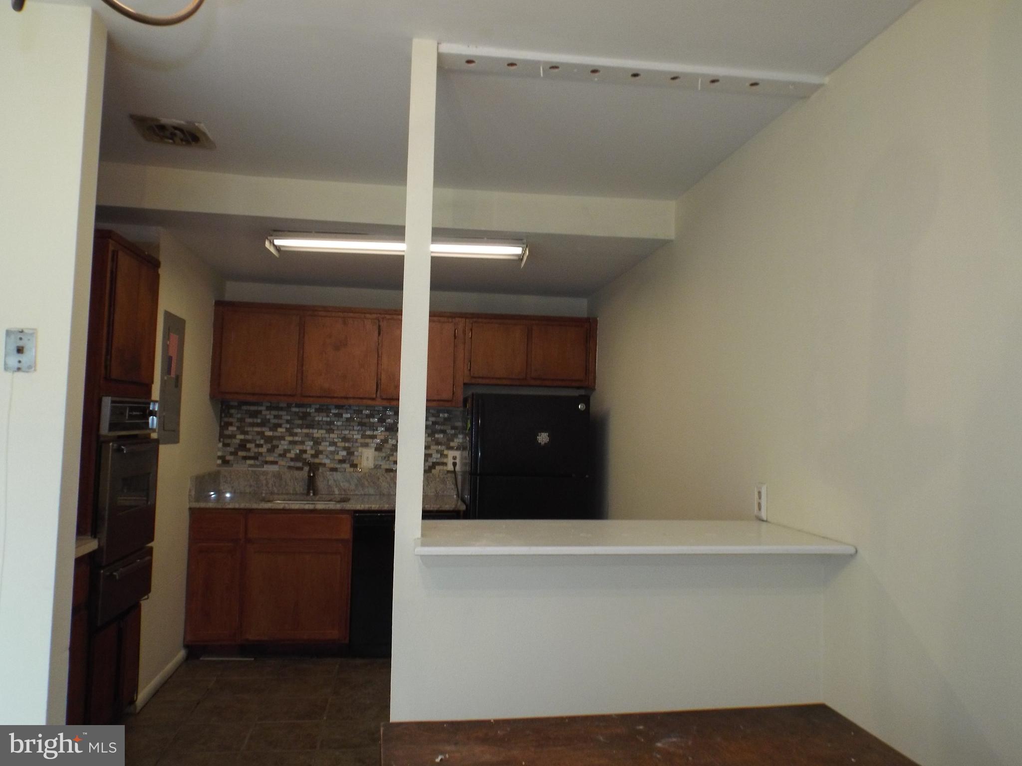 8616 Manchester Road, Unit 5 Silver Spring, MD 20901 - Photo 6 of 16 a bathroom with a bathtub