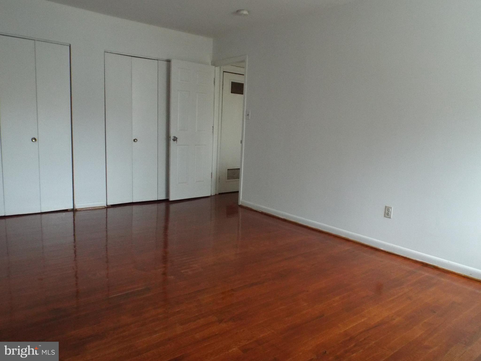 8616 Manchester Road, Unit 5 Silver Spring, MD 20901 - Photo 7 of 16 a view of a room with wooden floor
